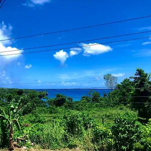 https://toga-guest-house.comcaribbean.com